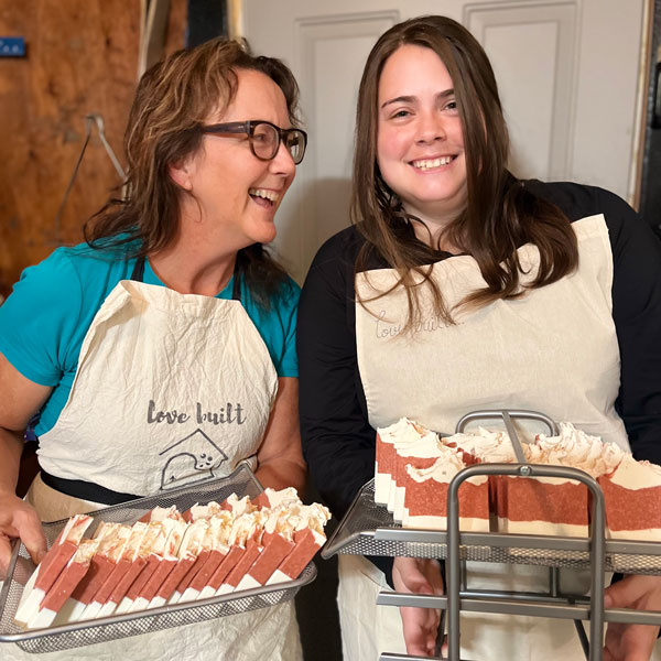 Fawn Purnell and a guest at a soap making workshop.